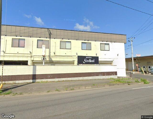 シンドバッド弘前店 左側からの外観