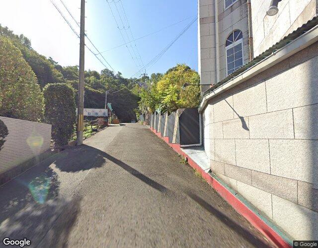 ホテル ゴルドーファビュラス 四條畷店 裏側からの外観