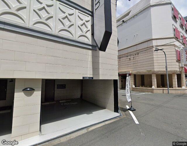 ホテル ジェムジェム 十三 右側からの外観
