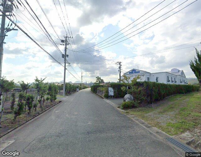 ホテル グリーンバナナ中津店 裏側からの外観